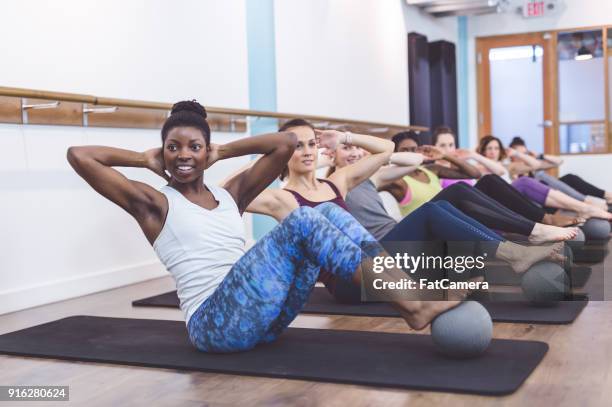 women doing barre workout together - hesitant to dance stock pictures, royalty-free photos & images