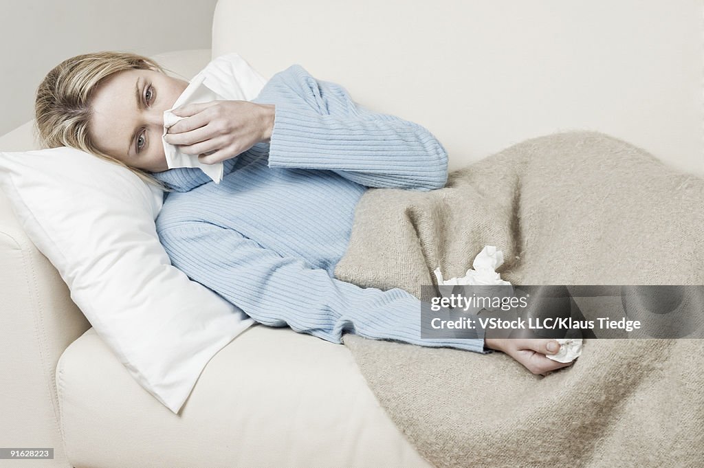 A woman feeling ill