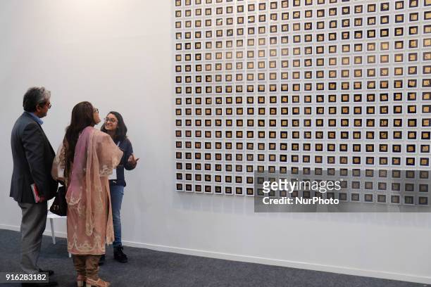 Spectaors enjoy art installations at the India Art Fair 2018 held on the Okhla NSIC grounds in New Delhi on February 9th, 2018. The annual fair draws...