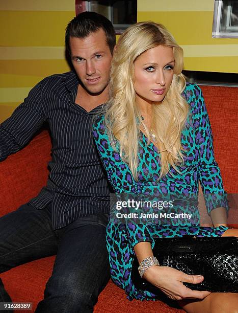 Doug Reinhardt and Paris Hilton attend the opening of Carnival at Bowlmor Lanes on October 8, 2009 in New York City.