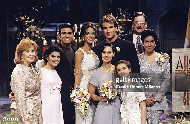 Peggy , Anita , Mateo , Julia , Rosa , Hector and Isabella posed with Maria and Edmund at their wedding, on Disney General Entertainment Content via...