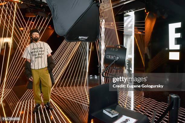 Ty Hunter poses for the E! Fashion Cam during IMG NYFW: The Shows at Spring Studios on February 9, 2018 in New York City.