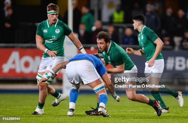 Dublin , Ireland - 9 February 2018; Ronan Kelleher of Ireland is tackled by Niccolò Cannone of Italy during the U20 Six Nations Rugby Championship...