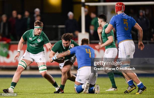 Dublin , Ireland - 9 February 2018; Ronan Kelleher of Ireland is tackled by Niccolò Cannone of Italy during the U20 Six Nations Rugby Championship...
