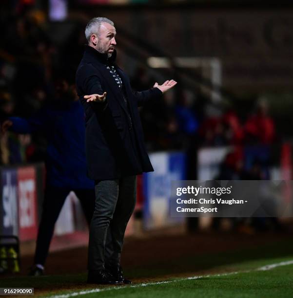 Cambridge United manager Shaun Derry shouts instructions to his team from the technical area during the Sky Bet League Two match between Cambridge...