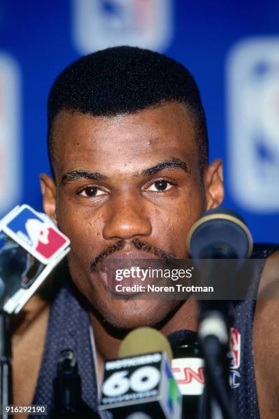 David Robinson of the San Antonio Spurs is presented the MVP Trophy during Game Two of the Conference Finals of the 1995 NBA Playoffs played on May...