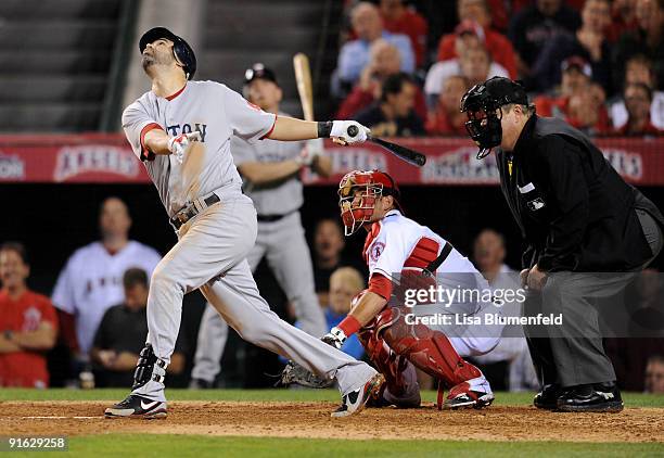 Mike Lowell of the Boston Red Sox flys out in the seventh inning against the Los Angeles Angels of Anaheim in Game One of the ALDS during the 2009...