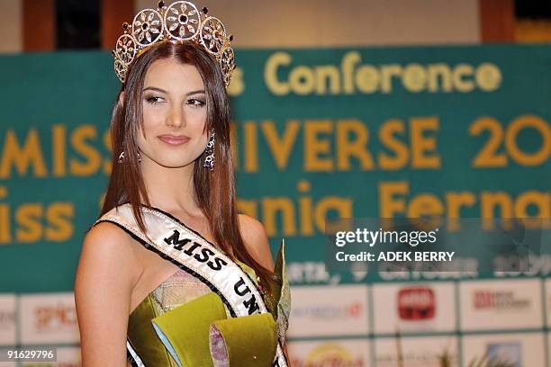 Venezuelan Stefania Fernandez poses for photographers after a press conference in Jakarta on October 9, 2009. Newly crowned Miss Universe Stefania...