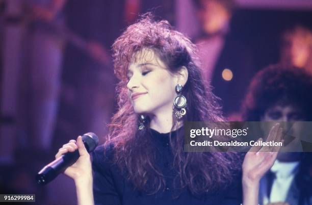 Pop star Tiffany performs on a TV show in 1987 in Los Angeles, California.