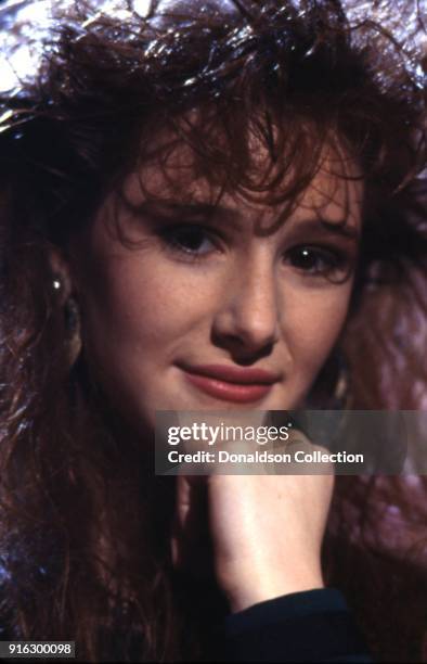 Pop star Tiffany poses for a portait on a TV show in 1987 in Los Angeles, California.