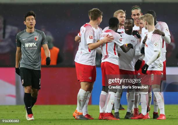 Naby Keita of RB Leipzig celebrates with team mates after scoring his team's second goal during the Bundesliga match between RB Leipzig and FC...