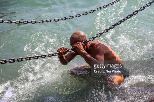 Man take holy bath in Ganga river at Har ki Pauri in Haridwar, Uttrakhand, India on 8th Feb ,2018.According to hindu culture Har ki Pauri one of the...