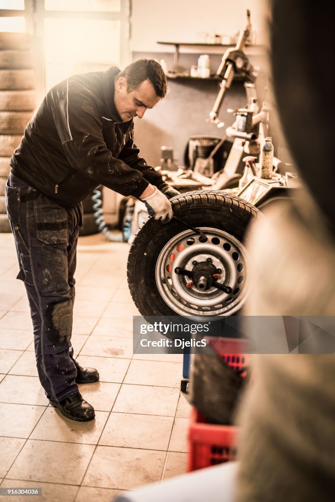 Distorted Mechanic Mechanic Putting A Damaged Wheel On A Dyno High-Res Stock Photo - Getty ...