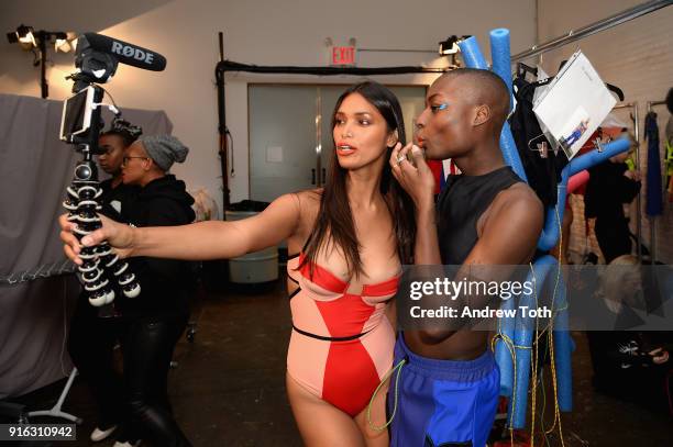 Models pose backstage for Chromat AW18 during New York Fashion Week at Industria Studios on February 9, 2018 in New York City.