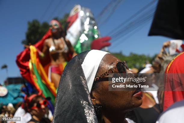 Revelers celebrate during the Carmelitas 'bloco', or block party, on February 9, 2018 in Rio de Janeiro, Brazil. Carnival officially began today....
