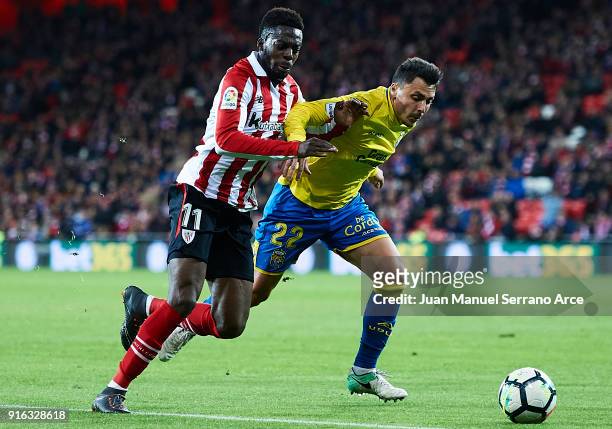 Inaki Williams of Athletic Club being followed by Ximo Navarro of Union Deportiva Las Palmas during the La Liga match between Athletic Club and...