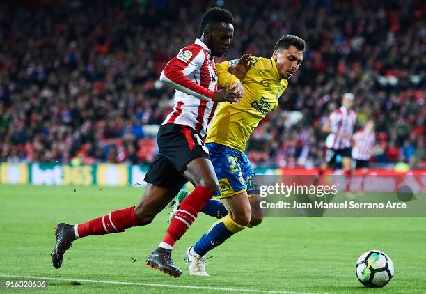 Inaki Williams of Athletic Club being followed by Ximo Navarro of Union Deportiva Las Palmas during the La Liga match between Athletic Club and...