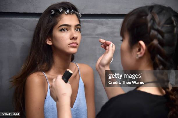 Model poses backstage for Matthew Adams Dolan during New York Fashion Week presented by Made at Gallery II at Spring Studios on February 9, 2018 in...