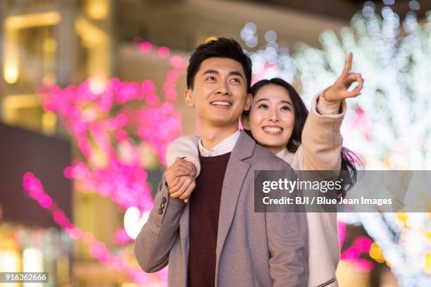 cheerful young couple dating - mad about heritage festival stockfoto's en -beelden