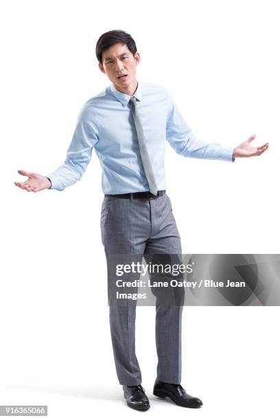 angry businessman shrugging - man outstretched arms ストックフォトと画像