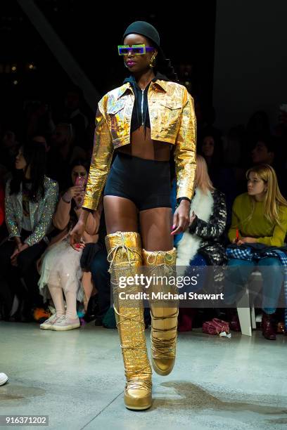 Maria Borges walks the runway during the Jeremy Scott fashion show during New York Fashion Week: The Shows at Gallery I at Spring Studios on February...