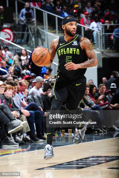 Malcolm Delaney of the Atlanta Hawks handles the ball during the game against the Cleveland Cavaliers on February 9, 2018 at Philips Arena in...