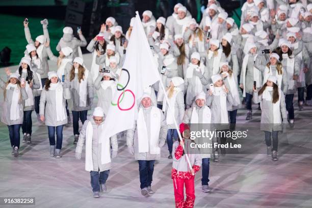 Flag bearer POCPG Volunteer of Olympic Athletes from Russia leads the team during the Opening Ceremony of the PyeongChang 2018 Winter Olympic Games...