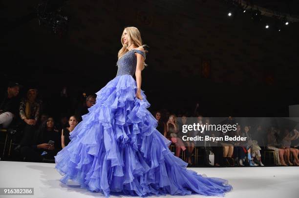 Models walk the runway during the NYFW Sherri Hill Runway Show on February 9, 2018 in New York City.