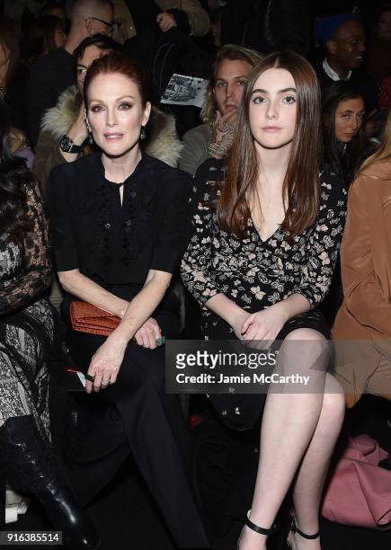 Julianne Moore and Liv Freundlich attend the Bottega Veneta Fall/Winter 2018 fashion show at New York Stock Exchange on February 9, 2018 in New York...