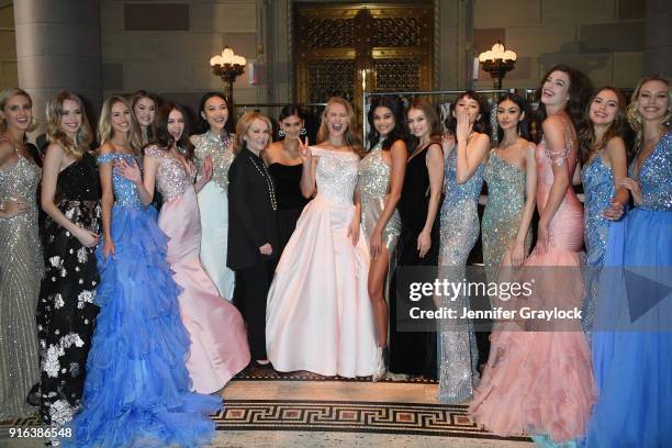 Designer Sherri Hill poses with her models backstage during the NYFW Sherri Hill Runway Show on February 9, 2018 in New York City.