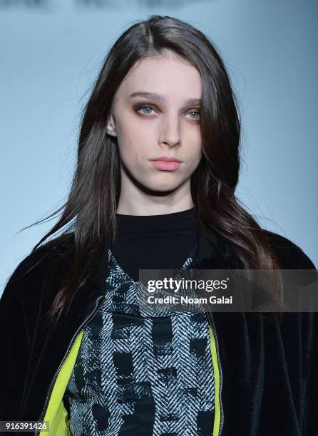 Model walks the runway during Mary Kary at Nicole Miller Fall 2018 at Industria Studios on February 9, 2018 in New York City.