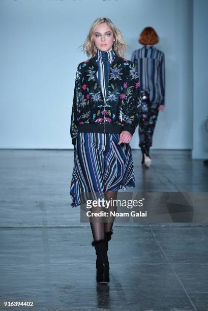 Model walks the runway during Mary Kary at Nicole Miller Fall 2018 at Industria Studios on February 9, 2018 in New York City.
