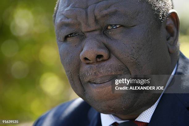 Zimbabwe opposition leader Morgan Tsvangirai addresses the media in Harare on July 02, 2008. Tsvangirai rejected forming a government of national...