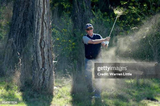 Wayne Gretzky plays his shot on the 17th hole during Round Two of the AT&T Pebble Beach Pro-Am at Monterey Peninsula Country Club on February 9, 2018...