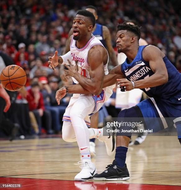 Jimmy Butler of the Minnesota Timberwolves knocks the ball away from David Nwaba of the Chicago Bulls at the United Center on February 9, 2018 in...