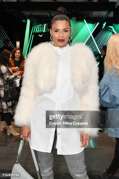 Television personality Kamie Crawford poses during New York Fashion Week: The Shows on February 9, 2018 in New York City.