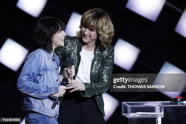 French actress and singer Charlotte Gainsbourg celebrates after receiving the best female artist award during the 33rd Victoires de la Musique, the...