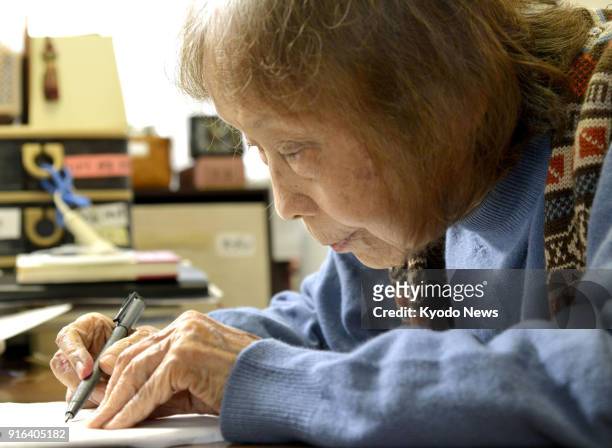 File photo taken in April 2015 shows Michiko Ishimure, a Japanese author known for her books on Minamata mercury poisoning disease, in Kumamoto,...