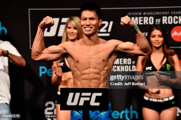 Ben Nguyen poses on the scale during the UFC 221 weigh-in at Perth Arena on February 10, 2018 in Perth, Australia.