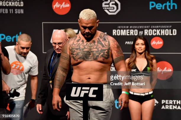 Mark Hunt of New Zealand poses on the scale during the UFC 221 weigh-in at Perth Arena on February 10, 2018 in Perth, Australia.