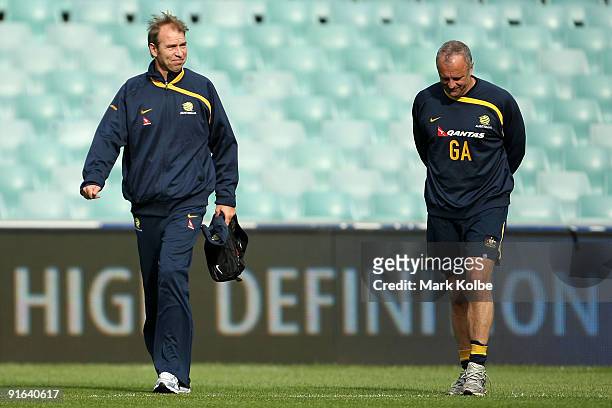 Pim Verbeek and Graham Arnold arrive for an Australian Socceroos training session at the Sydney Football Stadium on October 9, 2009 in Sydney,...