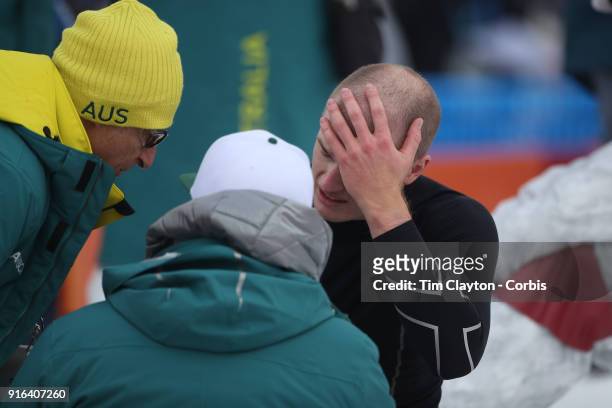 Brodie Summers of Australia injured during warm up before the Freestyle Skiing Men's Moguls Qualification at Phoenix Snow Park on February 9, 2018 in...