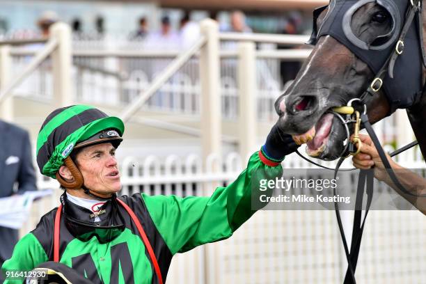 Craig Williams with Super Cash after winning the Schweppes Rubiton Stakes at Caulfield Racecourse on February 10, 2018 in Caulfield, Australia.