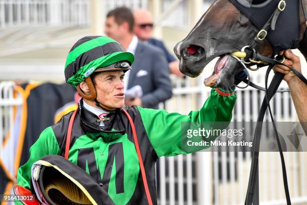 Craig Williams with Super Cash after winning the Schweppes Rubiton Stakes at Caulfield Racecourse on February 10, 2018 in Caulfield, Australia.