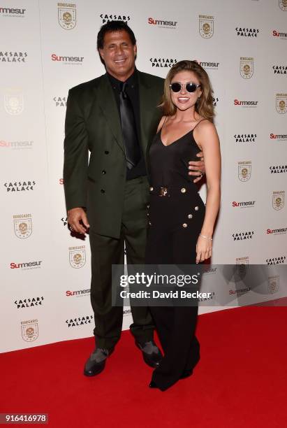 Former Major League Baseball player Jose Canseco and Morgan Strelow attend the grand opening of "Renegades" at Caesars Palace on February 9, 2018 in...