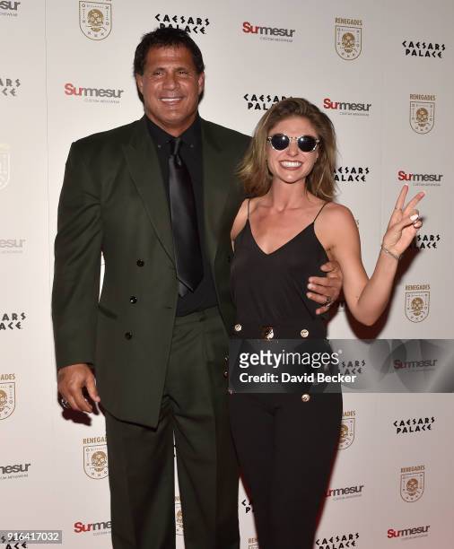 Former Major League Baseball player Jose Canseco and Morgan Strelow attend the grand opening of "Renegades" at Caesars Palace on February 9, 2018 in...
