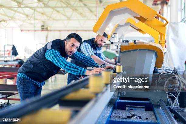 factory interiors for manufacturing pvc windows and doors - polimeros imagens e fotografias de stock