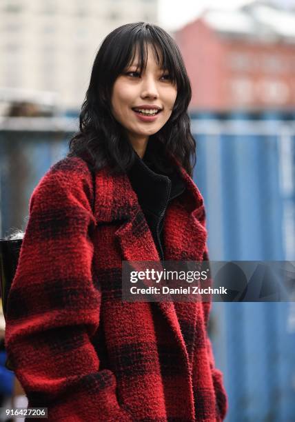 Model Heejung Park is seen outside the Brock Collection show during New York Fashion Week: Women's A/W 2018 on February 9, 2018 in New York City.