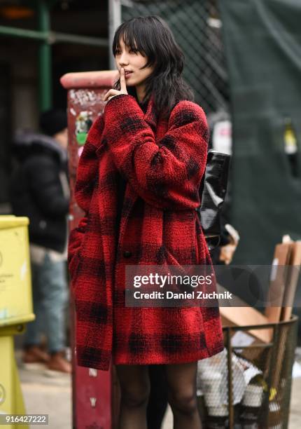 Model Heejung Park is seen outside the Brock Collection show during New York Fashion Week: Women's A/W 2018 on February 9, 2018 in New York City.