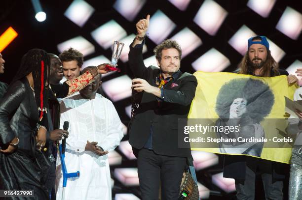 Singers Matthieu Chedid a.k.a. M, Toumani and Sidiki Diabate and Fatoumata Diawara receive the 'Album de Musiques du Monde' award during the 33rd...